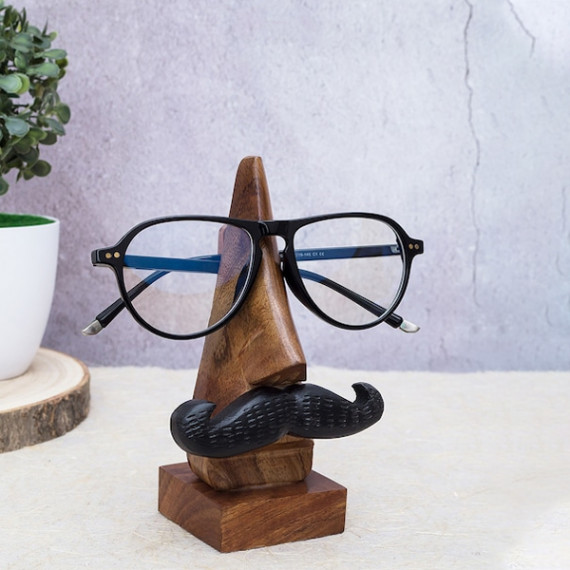 https://trendingfits.com/products/brown-handcrafted-eyeglass-holder-showpiece