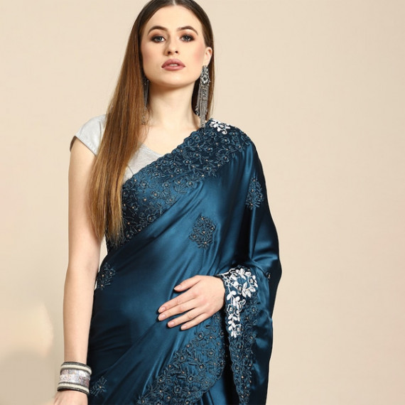 https://trendingfits.com/products/blue-floral-embroidered-satin-saree