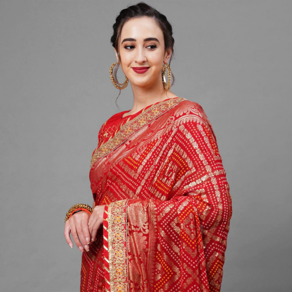 https://trendingfits.com/products/red-gold-toned-woven-design-bandhani-saree